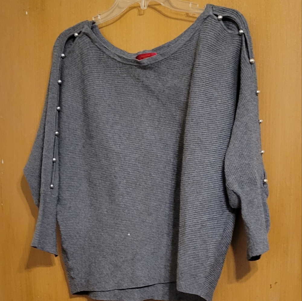 Jennifer Lopez Open Arm Sweater